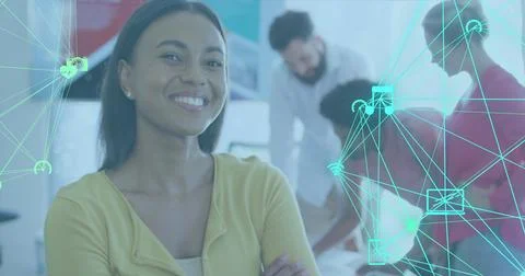 Image of icons connected with lines forming globes over smiling biracial woman Stock Photos