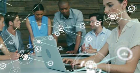 Image of icons connected with lines over diverse coworkers discussing and Stock Photos