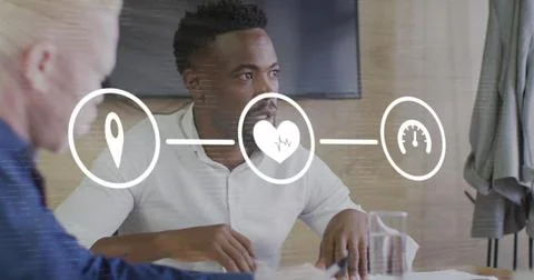 Image of icons connected with lines over diverse coworkers planning strategy in Stock Photos