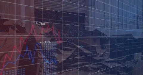 The image image shows financial data and graphs being generated over a junkya Stock Photos
