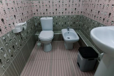 Image of inside freshly cleaned handicap toilet in a hospital, clinic Stock Photos