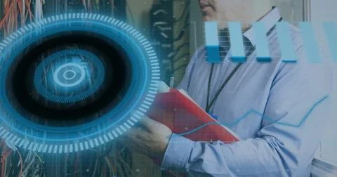 Image of interface with data processing over caucasian male engineer working at Foto stock