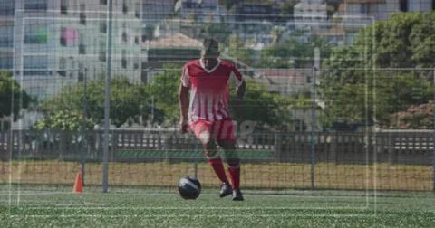 Image of interface processing data over biracial male footballer ball training Stock Photos