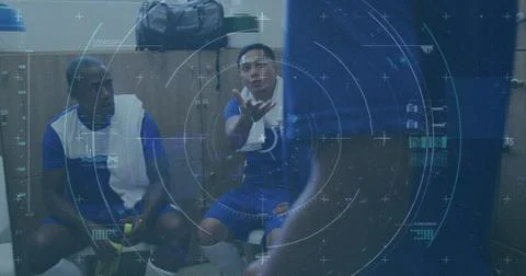 Image of interface processing data over diverse male sports team talking in Stock Photos