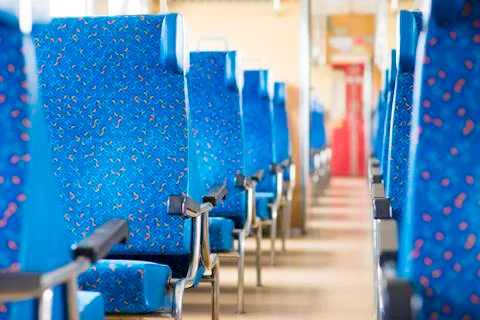 Image with the interior of a Czech train. An older train with comfortable and Stock Photos