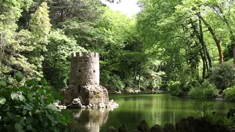 Image of a lake with a tower in the park, Sintra, Portugal Stock Footage 133284412