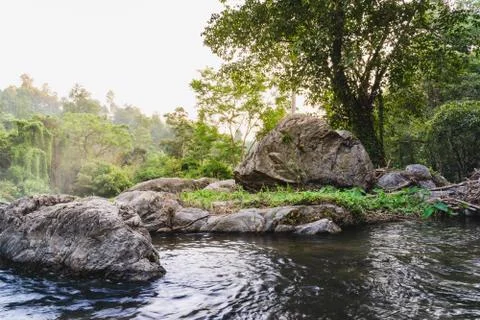 The image landscapse of a river and stream flowing through the rocks in the r Stock Photos