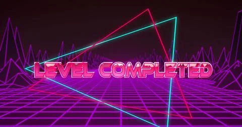 Image of level completed text over shapes 스톡 사진