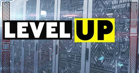 Image of level up text in white and black over computer server room Stock Photos