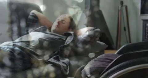 Image of light spots over disabled cuacasian man lying in bed Ilustração Stock