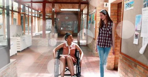 Image of light spots over disabled biracial student with friend 스톡 일러스트
