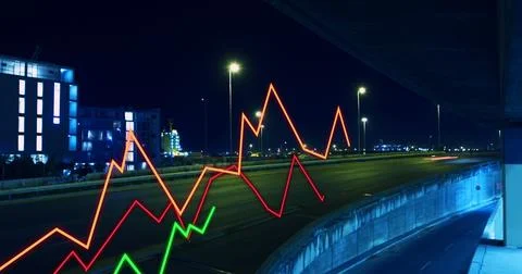 Image of lines and financial data processing over cityscape at night 스톡 사진