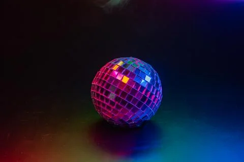 Image of a lit disco ball against a blurred background, commonly used in part Stock Photos