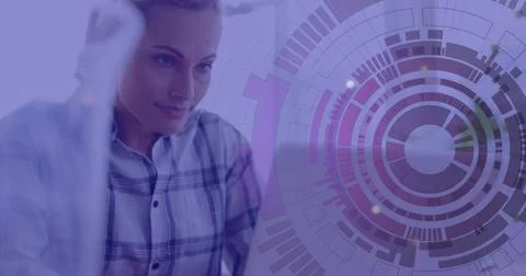 Image of loading circles over caucasian woman sitting on chair and working on Ilustración de archivo