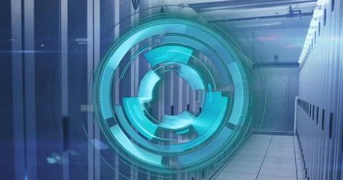 Image of loading circles over computer language against server room in back.. Stock Photos