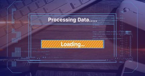 Image of loading over digital screen, mouse and keyboard on desk 스톡 사진