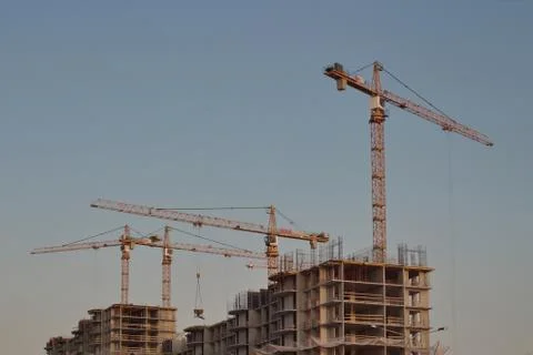 Image a lot of construction cranes. Stock Photos