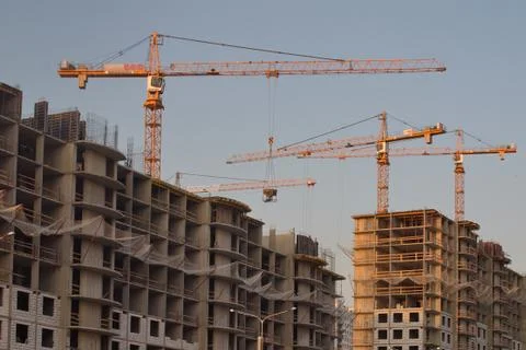 Image of a lot of construction cranes. Stock Photos