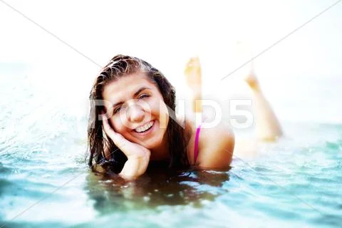 Image of luxurious woman having rest in water at summer Stock Photos