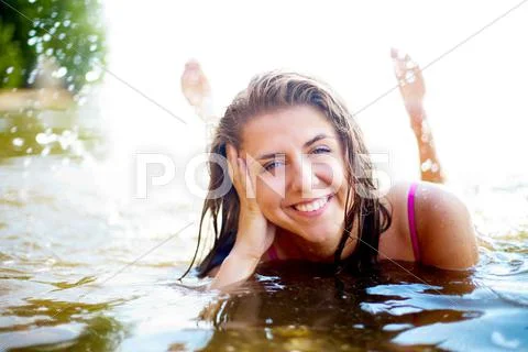 Image of luxurious woman having rest in water at summer Stock Photos