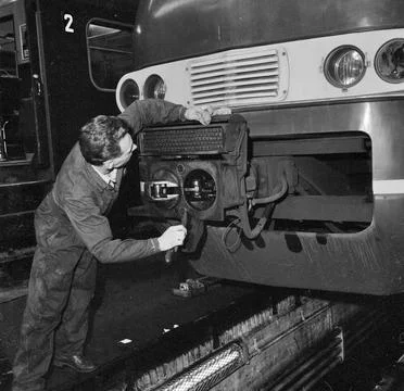 Image of a maintenance engineer during work on the automatic coupling of a... Stock Photos
