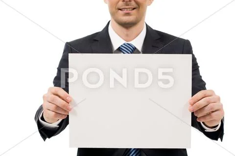 Image of male hand holding blank paper while advertising something Stock Photos