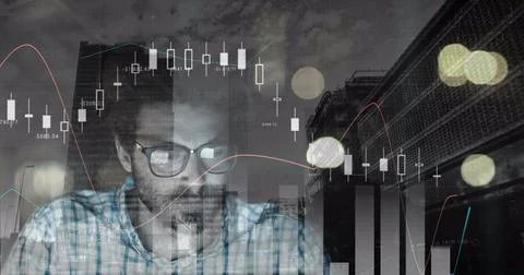 Image of male programmer and graphs over cityscape and road traffic Stock-Fotos