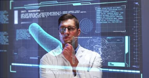Image of male scientist behind interactive computer screen with medical data Foto stock