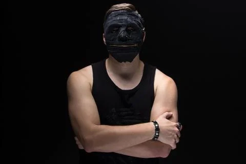Image of the man in handmade mask Stock Photos