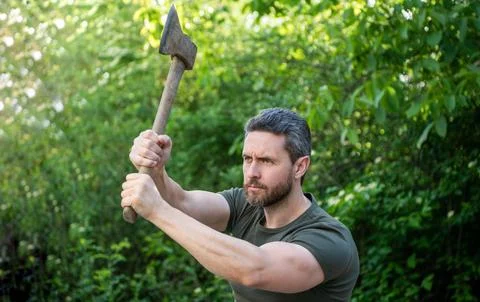 Image of man hit with axe. man hit with axe. man hit with axe wearing shirt. Foto stock