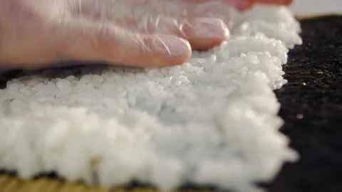 An image of man making california roll close-up Stock Footage 149979992