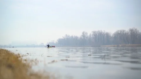 Image of man rowing alone at an artificial lake, Zagreb, Croatia. Stock Footage 105502921