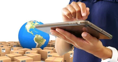 Image of man using tablet with stacks of boxes and globe on white background Stockfoto's
