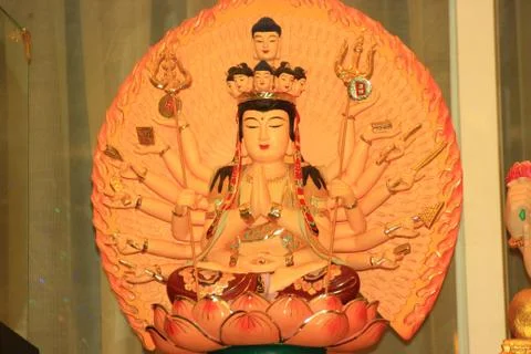 The image of many-armed Buddha Fotos de archivo