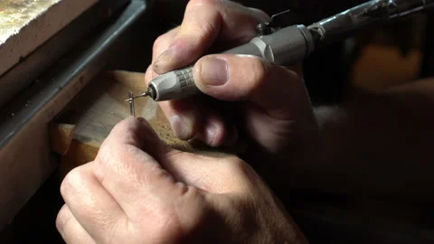 Image of a master jeweler working at the workshop table. A craftsman's hands Stock Footage 140534424