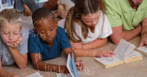 Image of math formulas over diverse children reading books at school Stock Photos