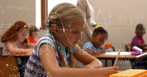 Image of math formulas over focused caucasian girl learning at school Stock Photos