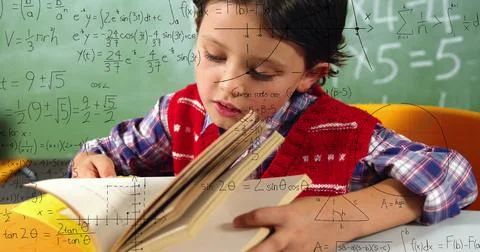 Image of math formulas over focused caucasian boy learning at school Stock Photos
