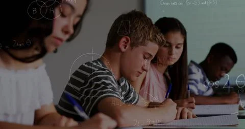Image of mathematical equations over school children writing in classroom Ilustração Stock