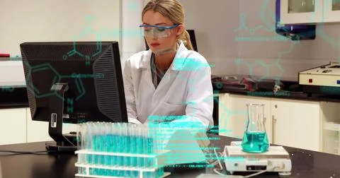 Image of medical data processing on caucasian female scientist using computer at Foto stock