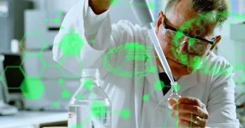 Image of medical data processing on caucasian male scientist performing Foto stock