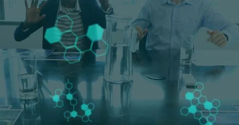 Image of medical data processing on interface, over man and woman wearing vr Stock Photos