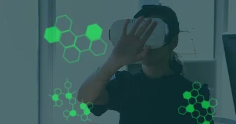 Image of medical data processing over businesswoman wearing vr headset Stock Photos