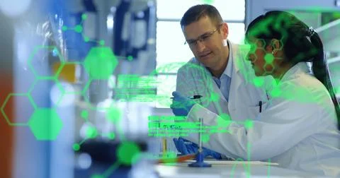 Image of medical data processing over diverse male and female scientists working Stock Photos