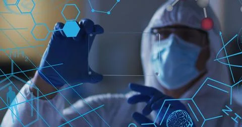 Image of medical data processing over caucasian man in face mask and ppe suit 스톡 사진