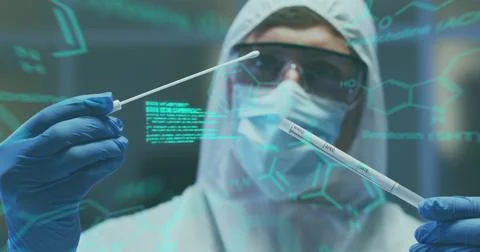 Image of medical data processing over caucasian man in face mask and ppe suit Stock Photos