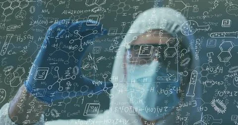 Image of medical data processing over caucasian man in face mask and ppe suit Stock Photos