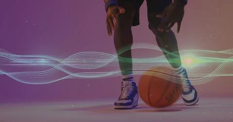 Image of mesh and neon pattern over african american basketball player Stock Photos