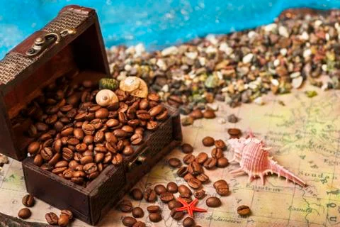 Image of middle-aged coffee beans. Poured into a pirate chest. Precious, expe Stock Photos