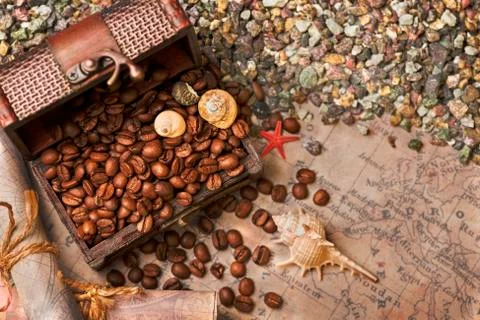 Image of middle-aged coffee beans. Poured into a pirate chest. Precious, expe Stock Photos